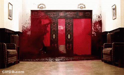 Bloody Hallway With Red Elevator And Chairs GIF