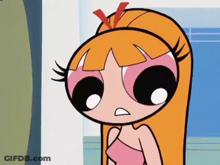 Blossom From The Powerpuff Girls Is Wearing A Pink Top And Making A Face . GIF