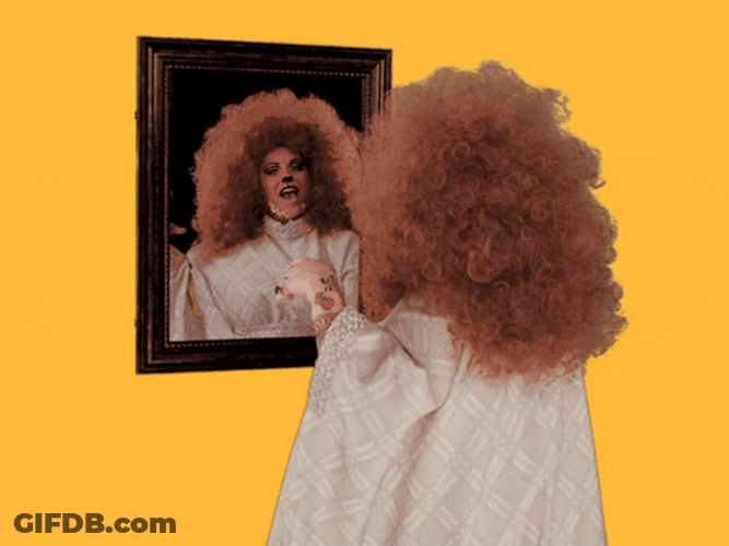 Blowing A Kiss To The Mirror GIF
