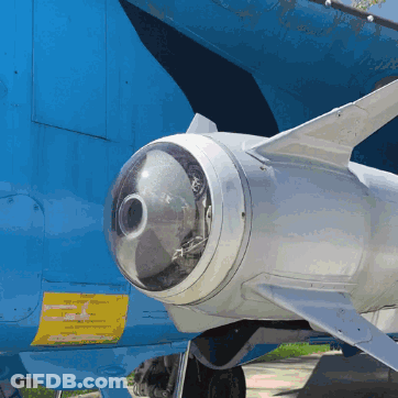 Blue Airplane With Warning Sticker GIF