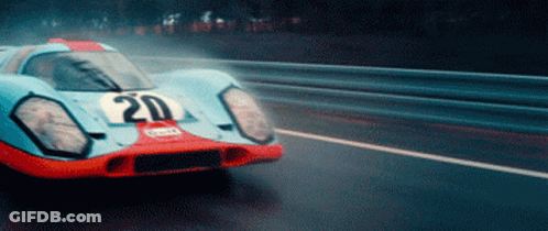 Blue And Orange Race Car Number 20 GIF
