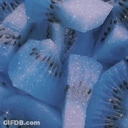 Blue And White Flowers Floating In Water GIF