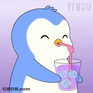 Blue And White Penguin Drinking Glass With Ice Cubes GIF