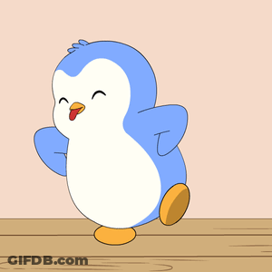 Blue And White Penguin On Wooden Table GIF