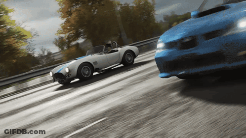 Blue And White Sports Car On Highway GIF