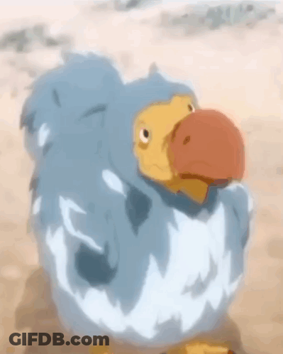 Blue And Yellow Cartoon Bird On Sandy Beach GIF