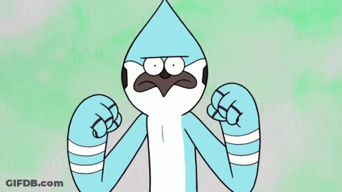 Blue Bird With Green Beak In Front Of Bush GIF