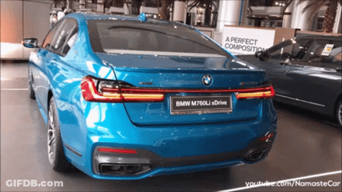 Blue BMW M760Li XDrive In Showroom GIF