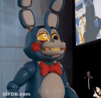 Blue Bunny With Red Bow Tie And Yellow Eyes GIF