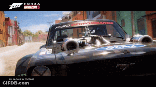 Blue Car Driving On Road Under Bridge GIF