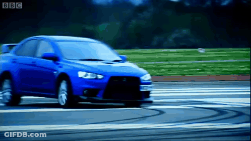 Blue Car Driving On Road With BBC Logo GIF