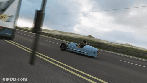 Blue Car Driving On Road With Yellow Line GIF