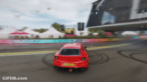 Blue Car Driving On Track With Smoke GIF