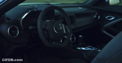 Blue Car Parked Next To White Car With Motoregist GIF