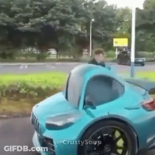 Blue Car With Hood Up Parked On Road GIF