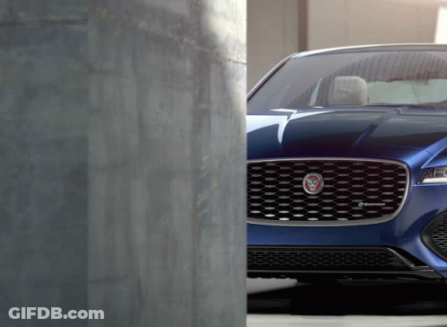 Blue Car With Jaguar Logo GIF