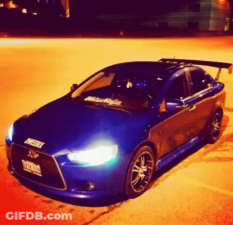 Blue Car With Mitsubishi Sticker GIF