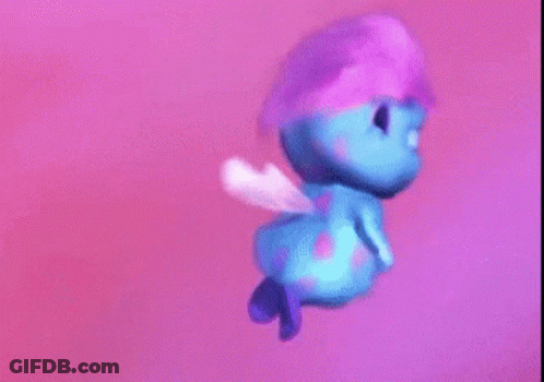 Blue Cartoon Character Flying With Purple Hat And Wings GIF