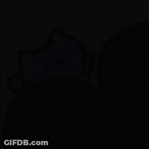 Blue Cat Laying On Gray Surface GIF