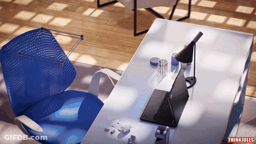 Blue Chair In Front Of Desk With Laptop Saying Think Jules GIF