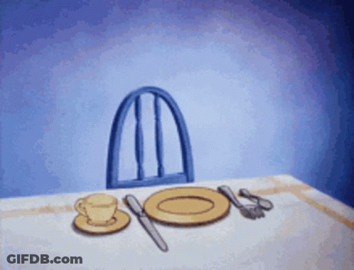 Blue Chair On Table With Plates And Utensils GIF