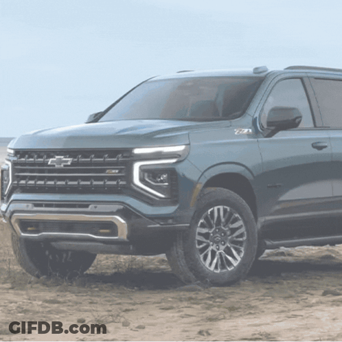 Blue Chevrolet SUV Parked On Dirt Road GIF