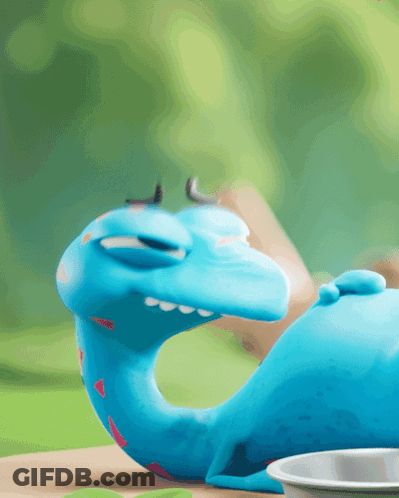 Blue Dinosaur Lying Next To Food Bowl GIF