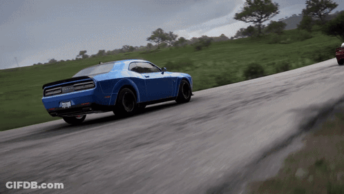 Blue Dodge Challenger Driving Next To Red Car GIF
