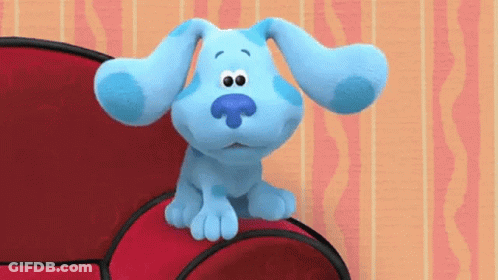 Blue Dog Sitting On Red Couch GIF