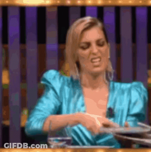 Blue Dress Woman Making Funny Face At Tray GIF