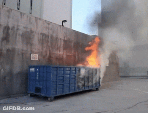 Blue Dumpster On Fire With No Parking Sign GIF