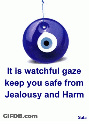 Blue Evil Eye Hanging From String It Is Watchful Gaze Keep You Safe From Jealousy And Harm GIF