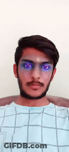 Blue-Eyed Bearded Man In Blue And White Checkered Shirt GIF