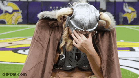 Blue-Eyed Bearded Man Looking At Camera GIF