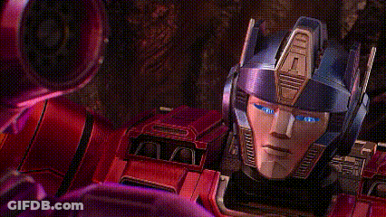 Blue-Eyed Robot In Front Of Yellow Robot GIF