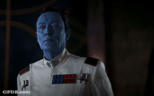 Blue Face Man With Red Eyes And White Uniform GIF