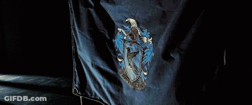 Blue Flag With Crest Saying Ravenclaw GIF