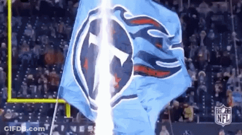Blue Flag With T Flying In Wind GIF