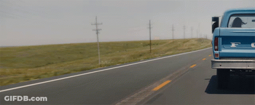 Blue Ford Truck Driving On Highway GIF