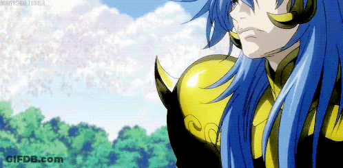 Blue Haired Anime Character In Gold Armor GIF