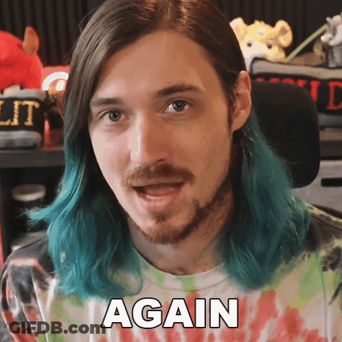 Blue Haired Bearded Man In Again Tie Dye GIF