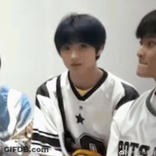 Blue-Haired Boy In White And Black Star Jersey GIF