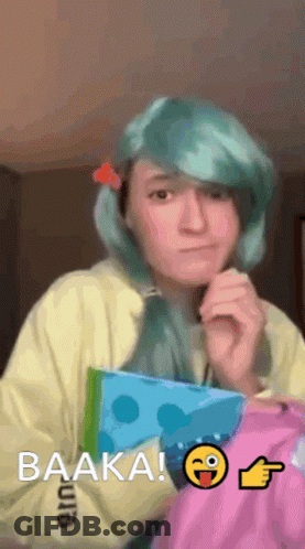 Blue-Haired Girl Holding Book Saying Baaka GIF