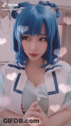 Blue-Haired Girl In Sailor Jacket GIF