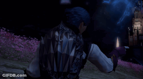 Blue-Haired Man In Pink Flower Field At Night GIF