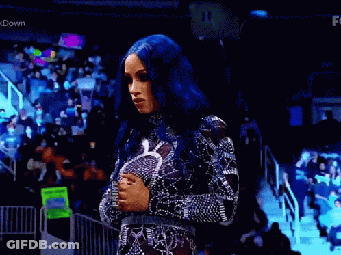 Blue-Haired Woman Before Crowd In Black-White Dress GIF