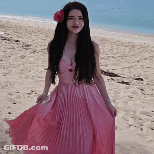 Blue-Haired Woman In Black And White Dress Before Crowd GIF