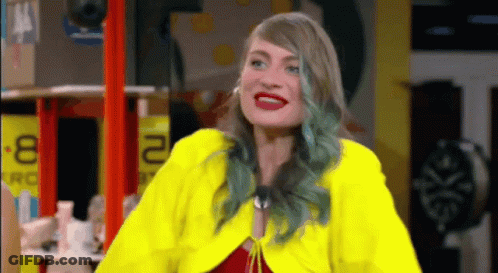 Blue-Haired Woman In Yellow Jacket Number 2 GIF