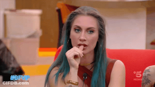 Blue-Haired Woman Sitting On Red Couch #Gfvip GIF