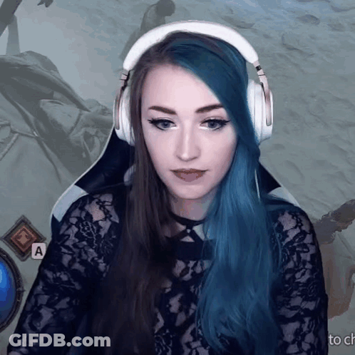 Blue-Haired Woman With Headphones And Black Top GIF